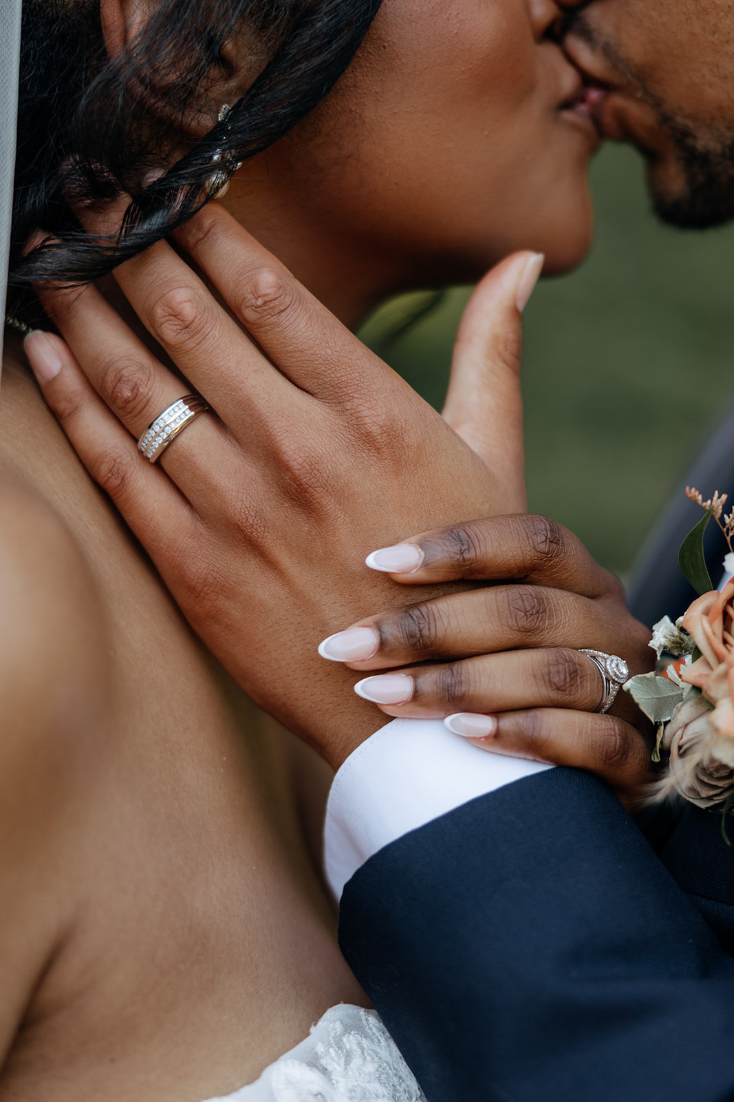 close up shot of a bride and groom kissing
