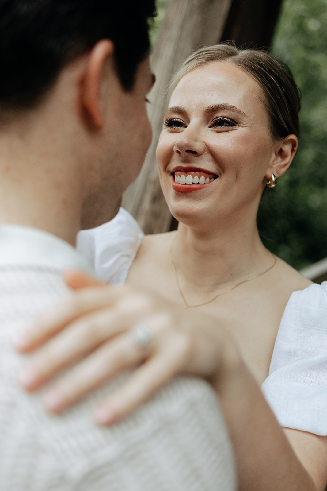 couple at engagement session on a rainy day