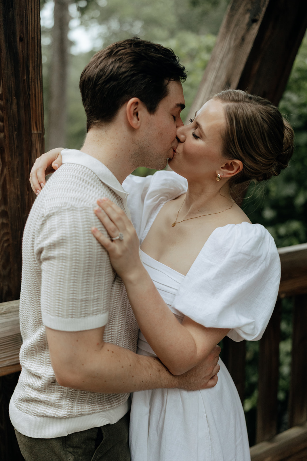 couple at engagement session on a rainy day