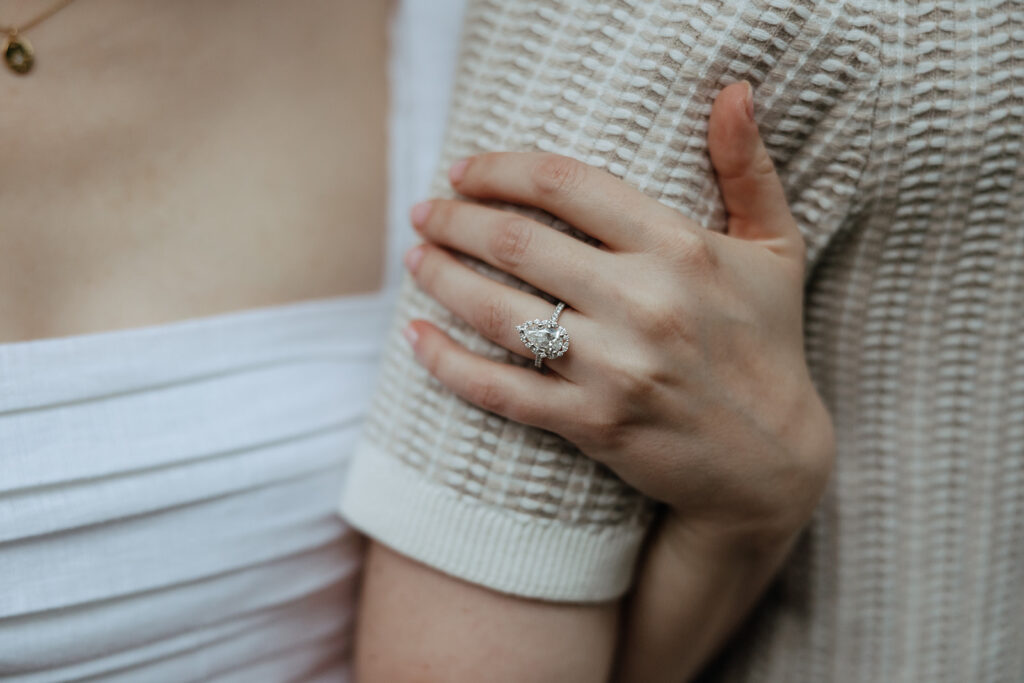 couple at engagement session on a rainy day
