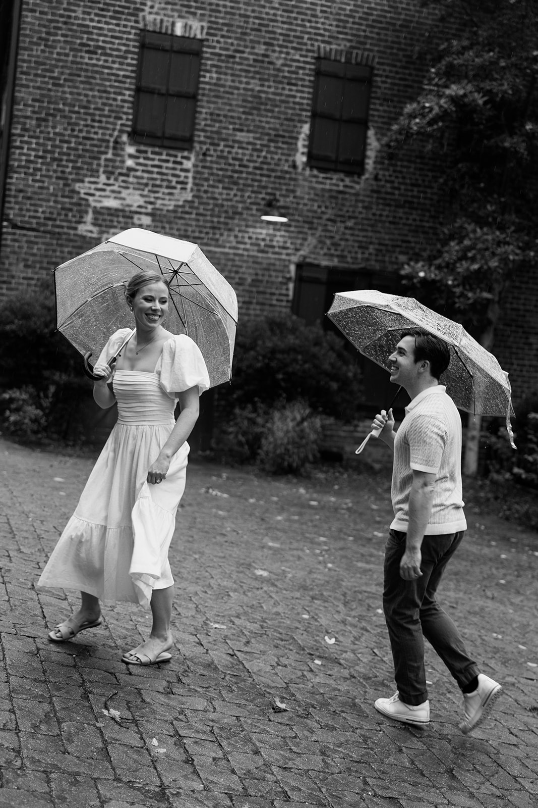 couple at engagement session on a rainy day