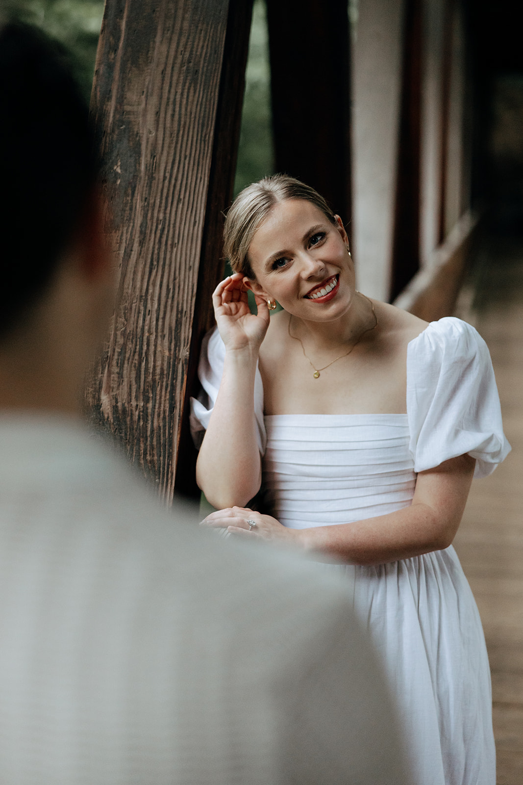 couple at engagement session on a rainy day
