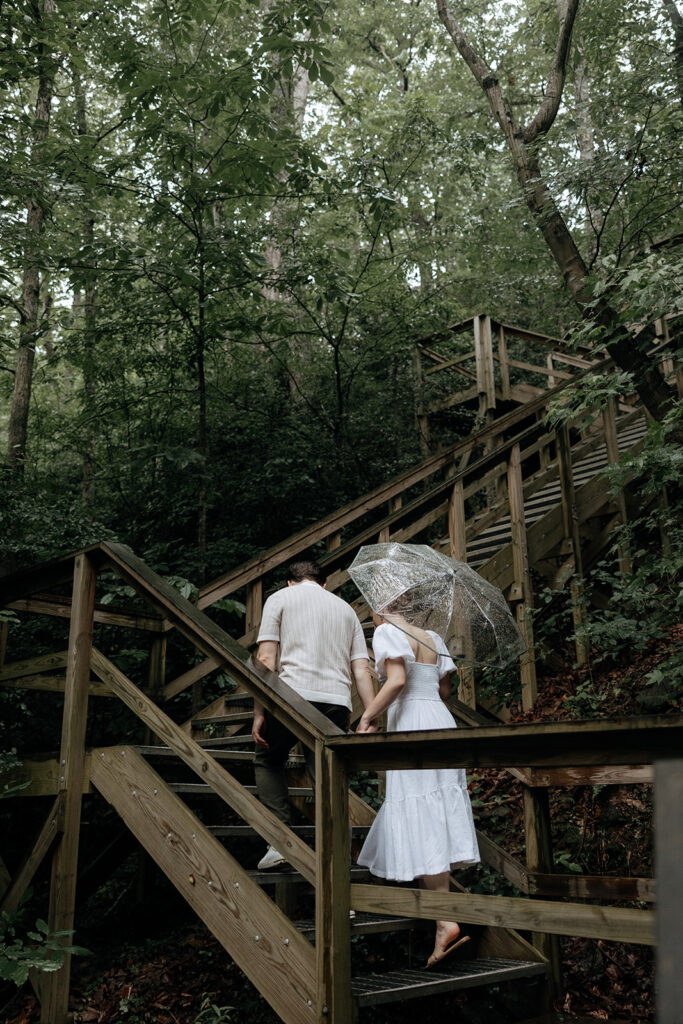 couple at engagement session on a rainy day