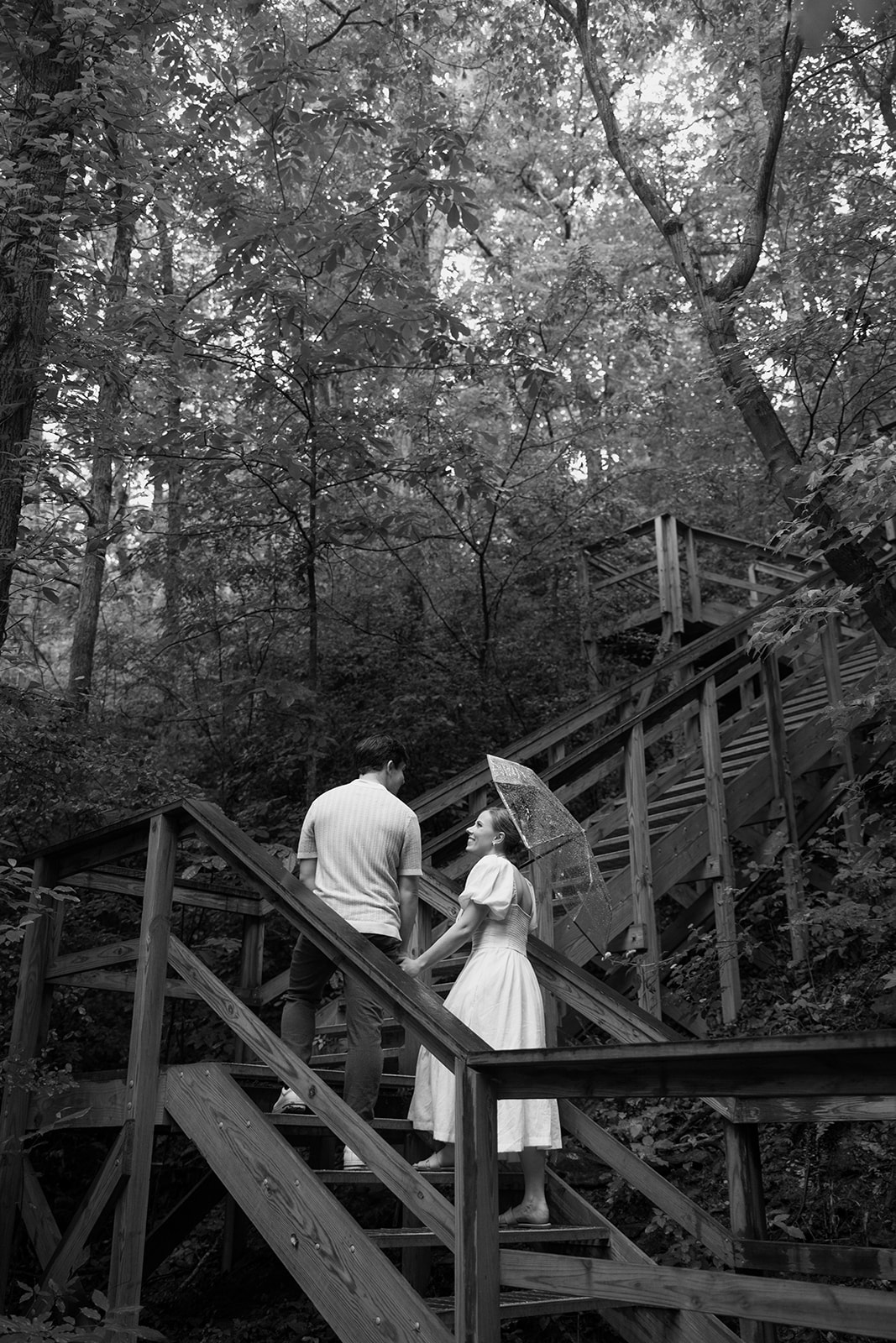 couple at engagement session on a rainy day