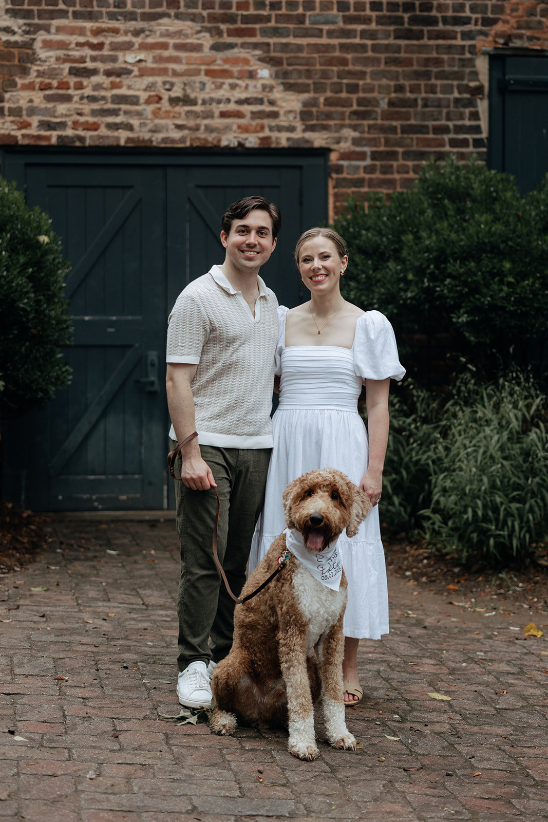 couple at engagement session on a rainy day