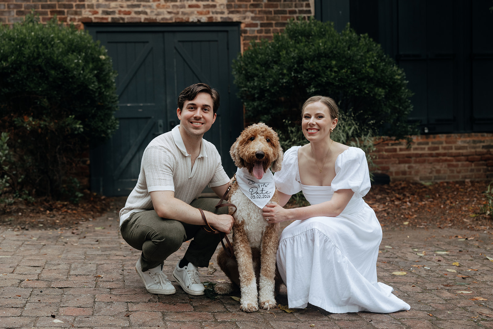 couple at engagement session on a rainy day