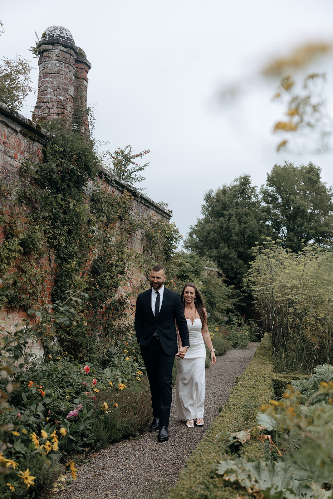 stunning couple pose for photos on the beautiful Dromoland castle grounds