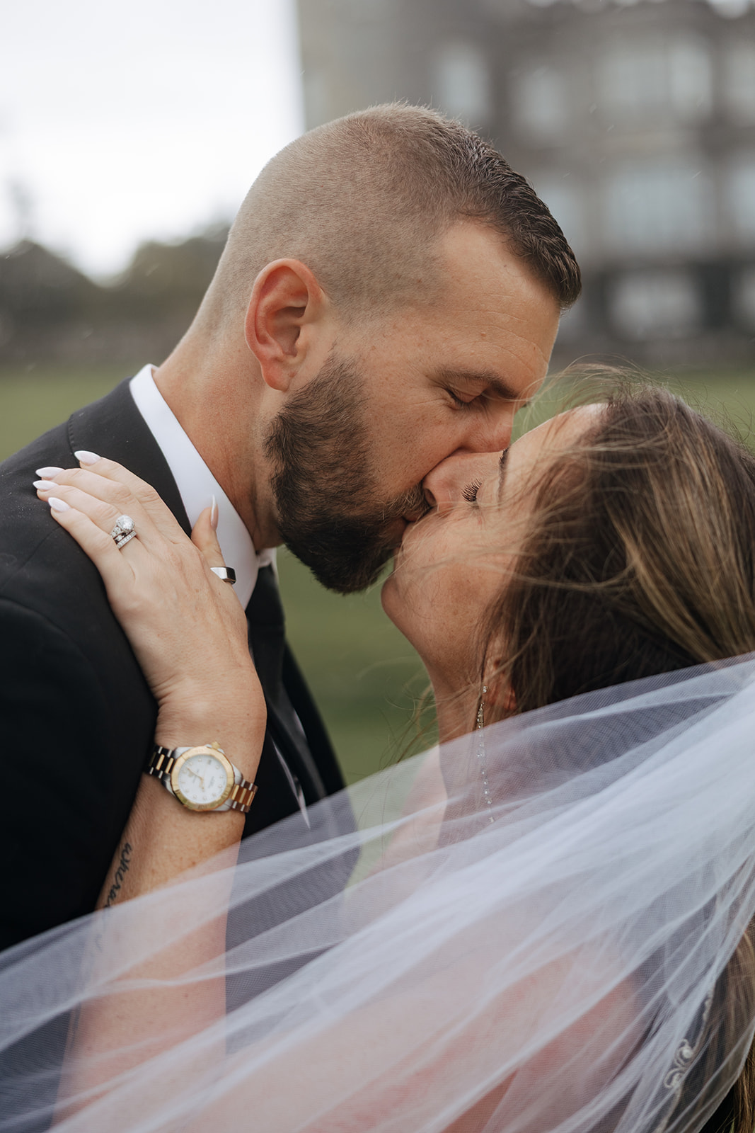 stunning couple share a kiss during their Ireland vow renewal