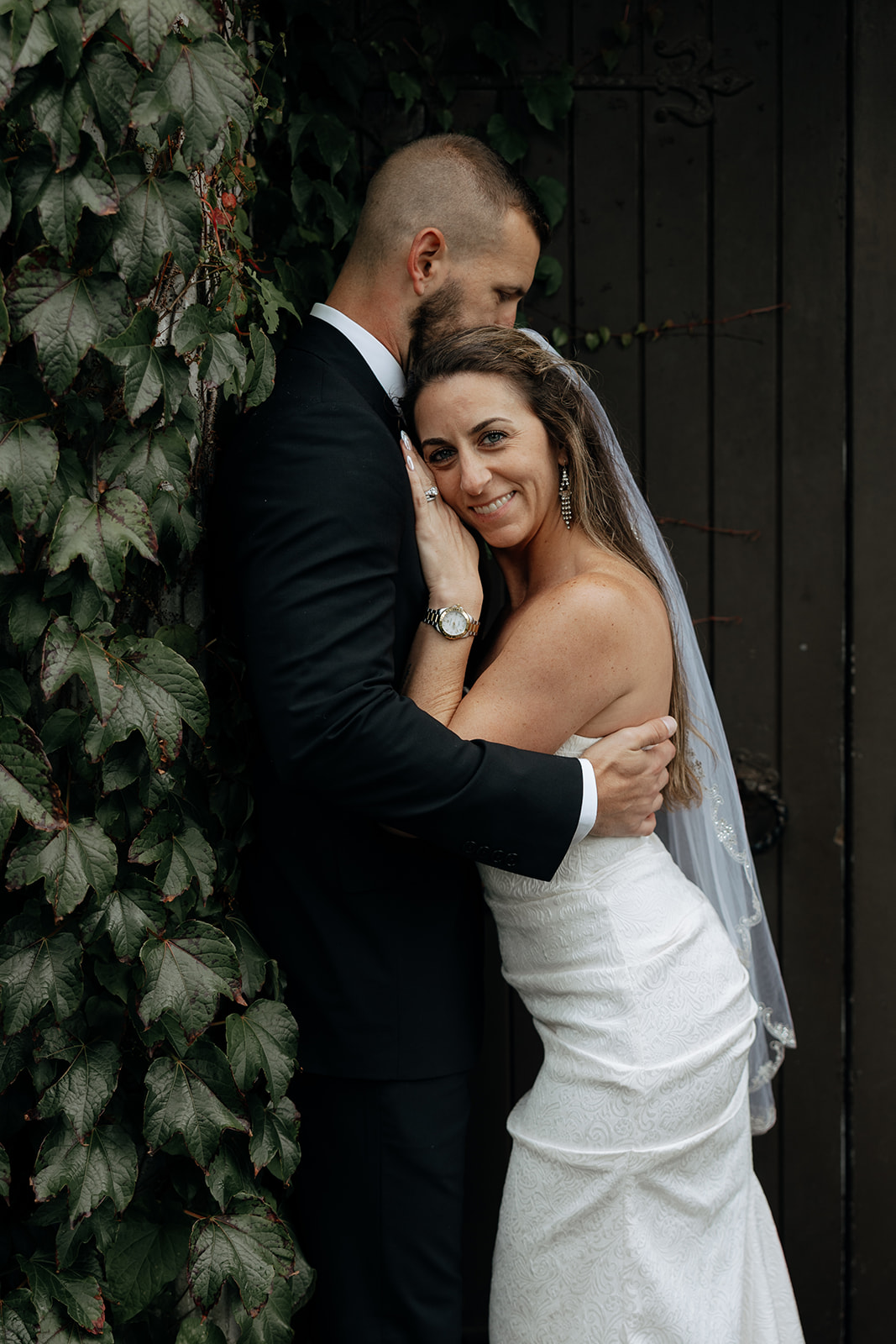 stunning couple pose for photos on the beautiful Dromoland castle grounds
