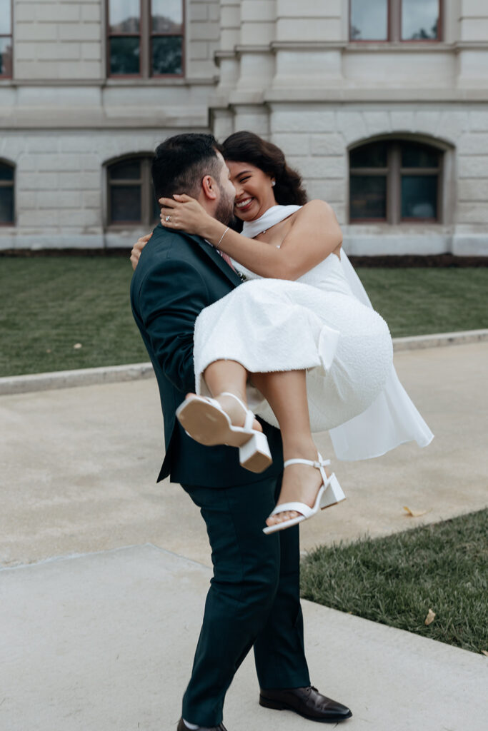stunning bride and groom share an intimate moment outside during their Georgia state capitol elopement