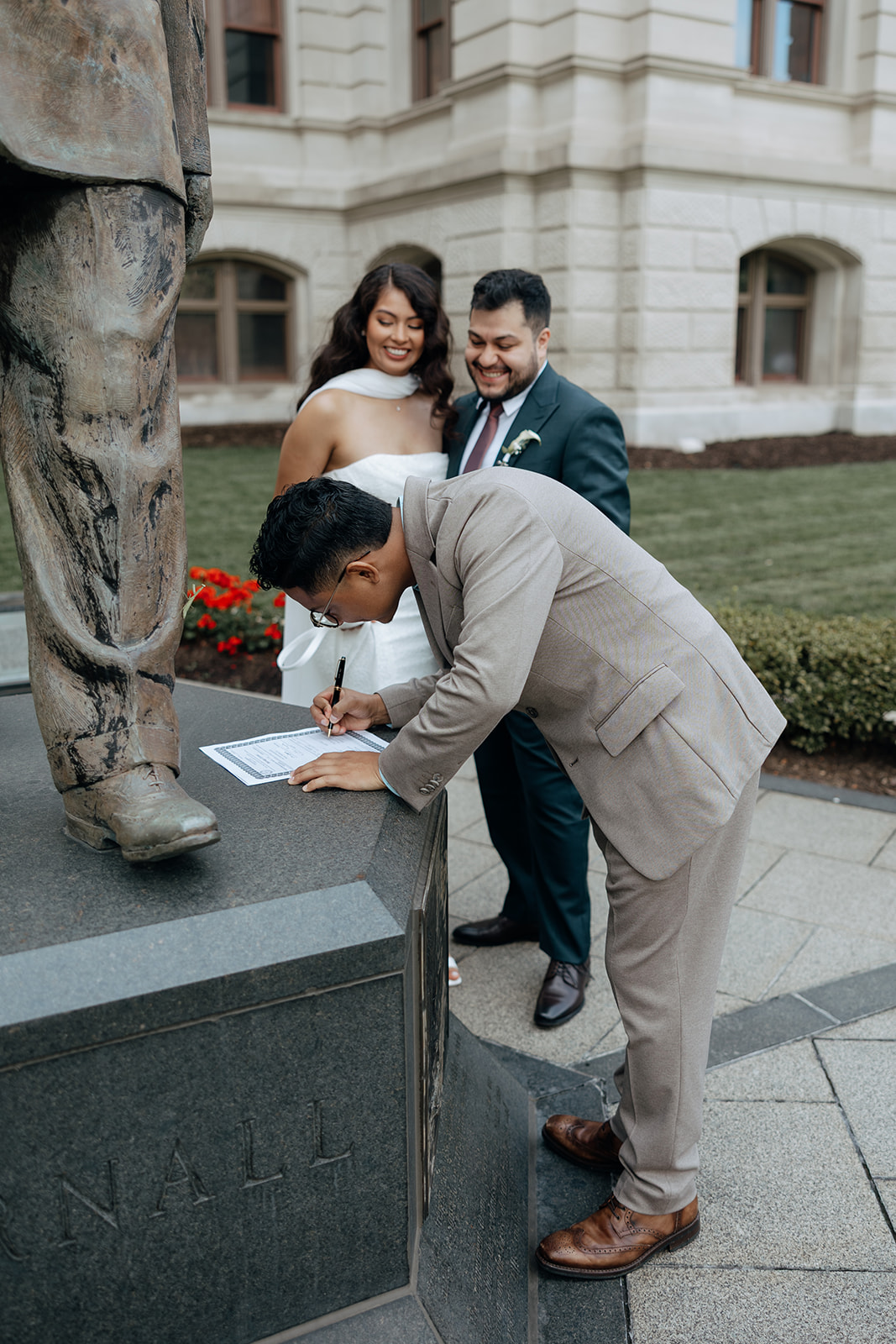 officiant signs marriage license to make things official