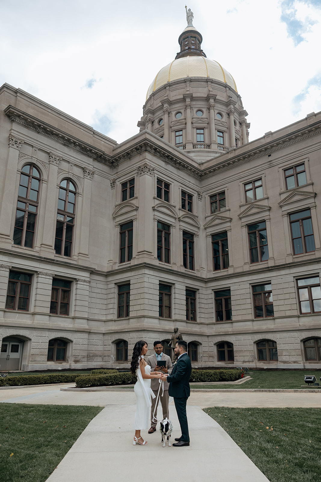 bride and groom have their stunning Georgia state capitol elopement ceremony