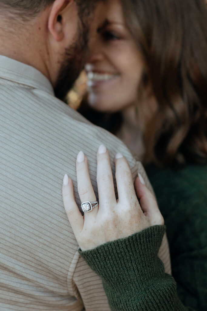 couple pose together during their traditional engagement session 