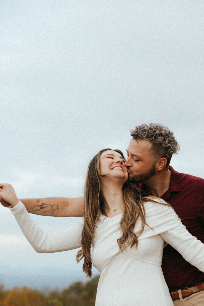 couple posing together during their portraits captured by Rachel Boyd Photography