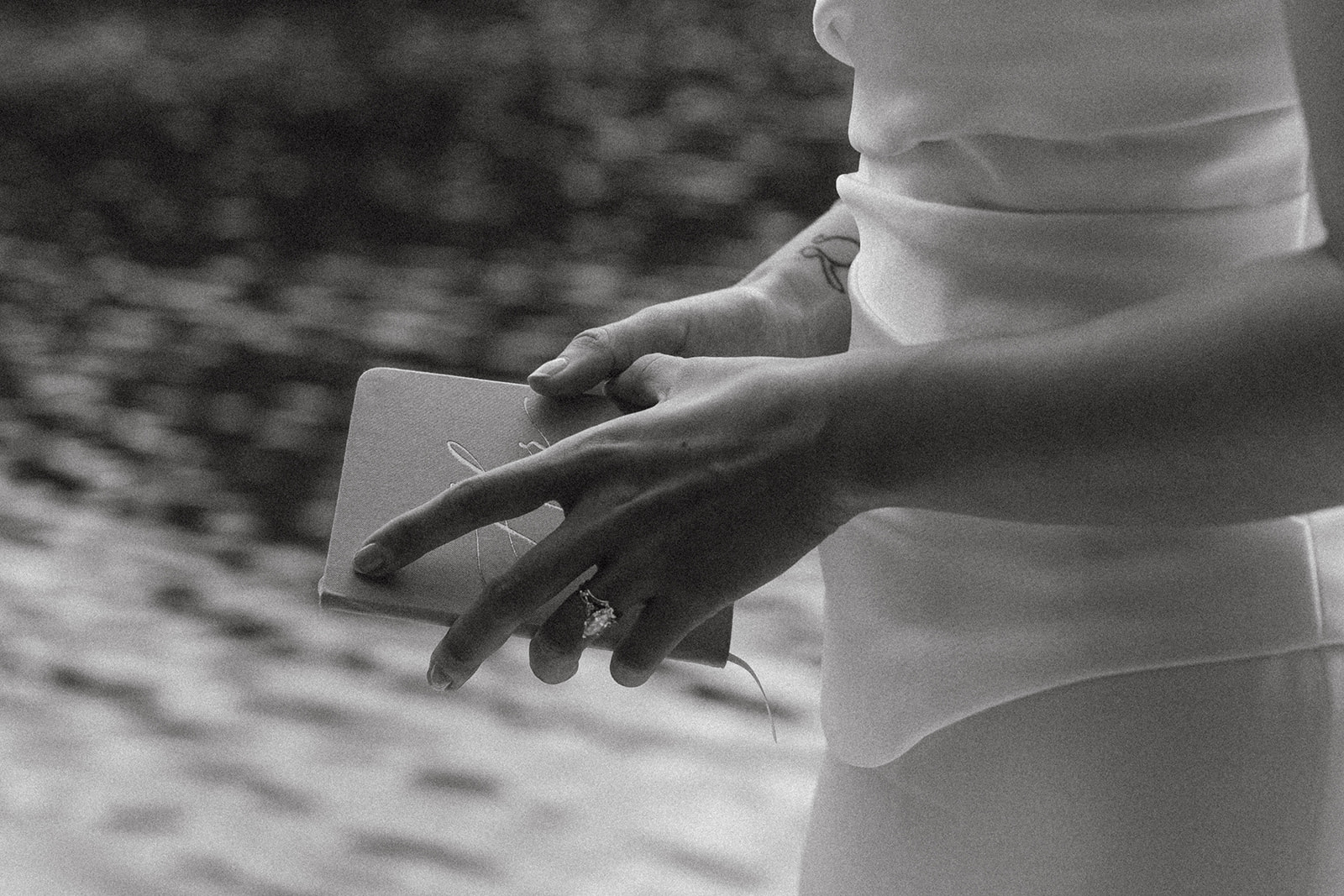 bride begins to open her vow book