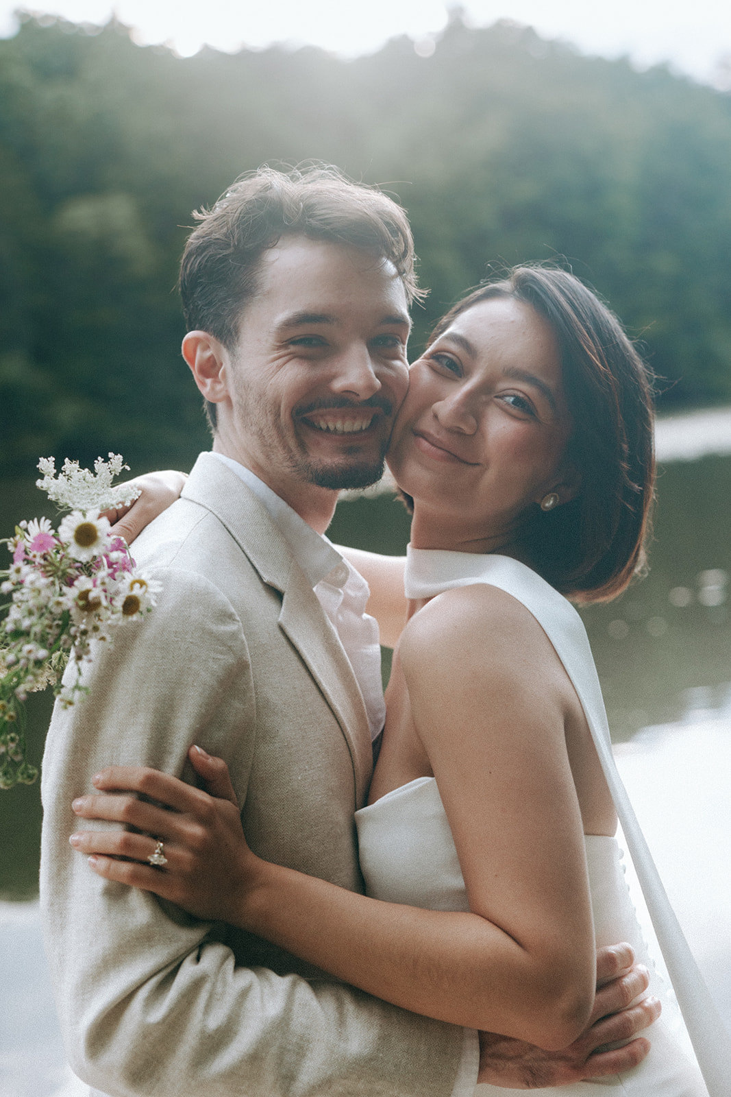 couple pose after their lakeside dahlonega elopement 